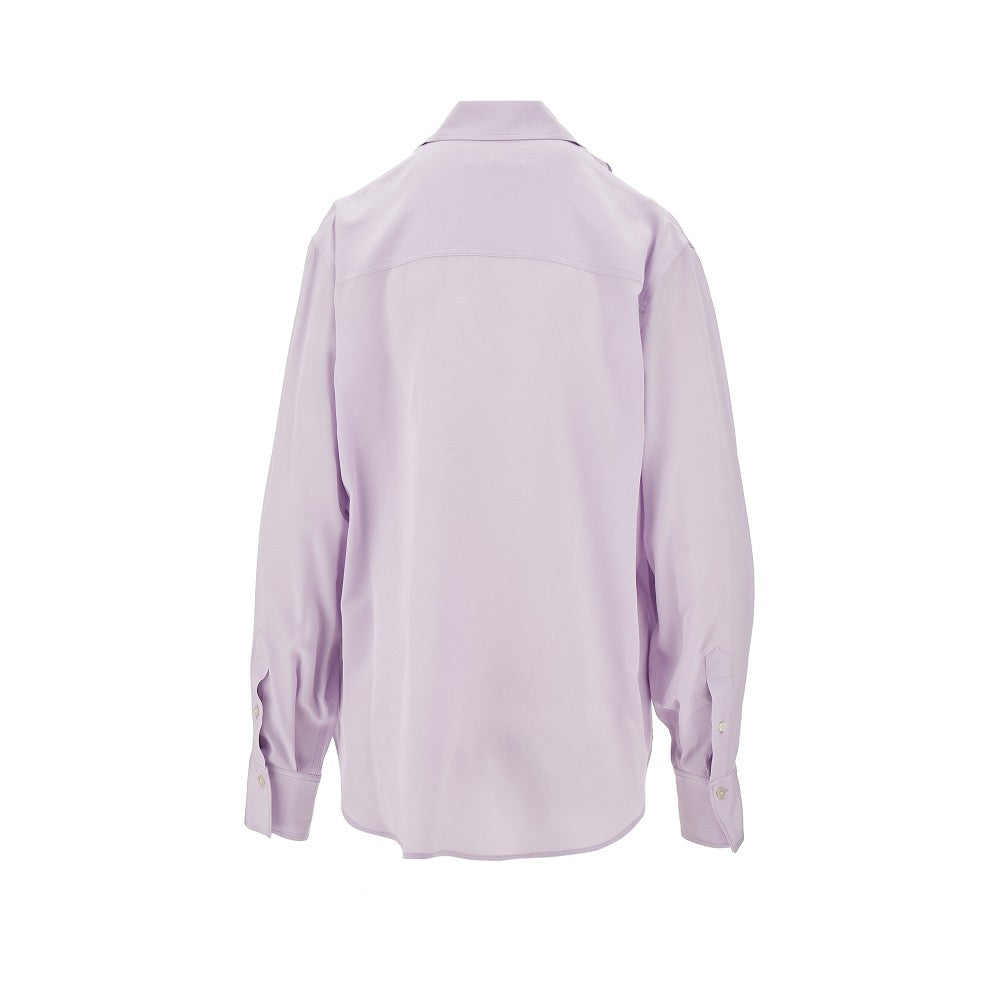 Blusa in seta con volant