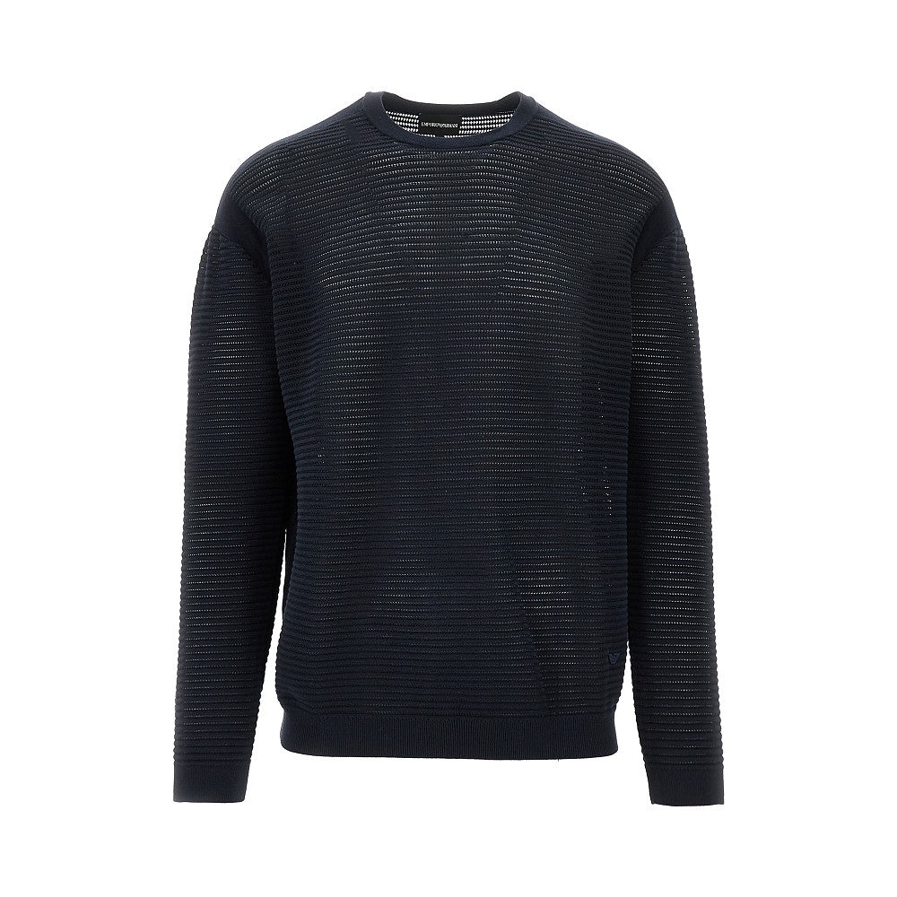 Knitted sweater with openworked motif