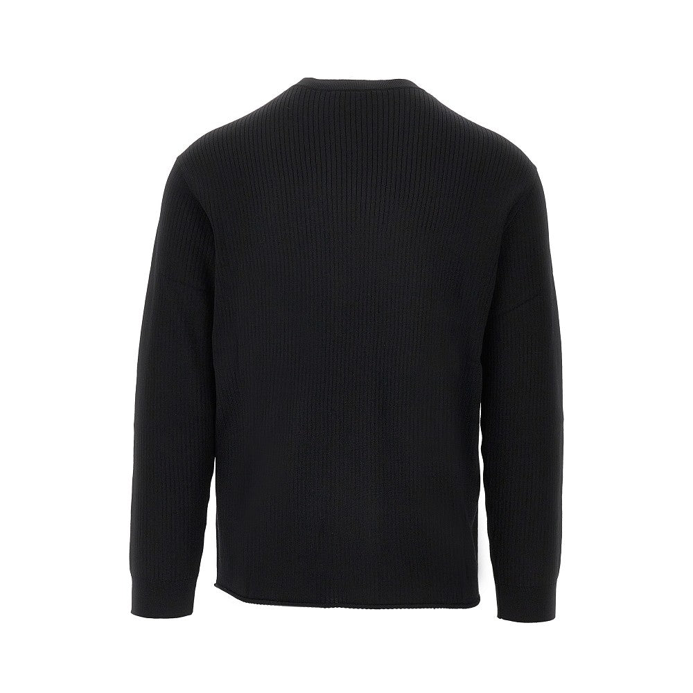 Maglia in lana a costine con scollo a V