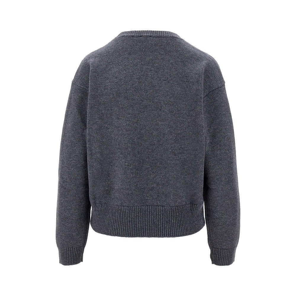 Wool sweater with logo inlay