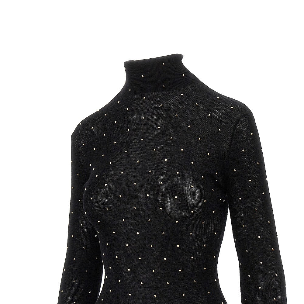 Top a collo alto in lana con borchie