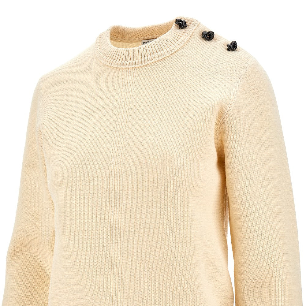 Wool sweater with knot buttons