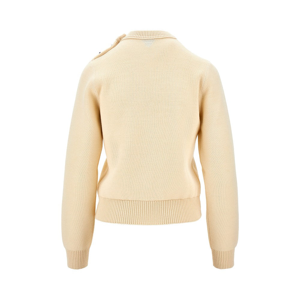 Wool sweater with knot buttons