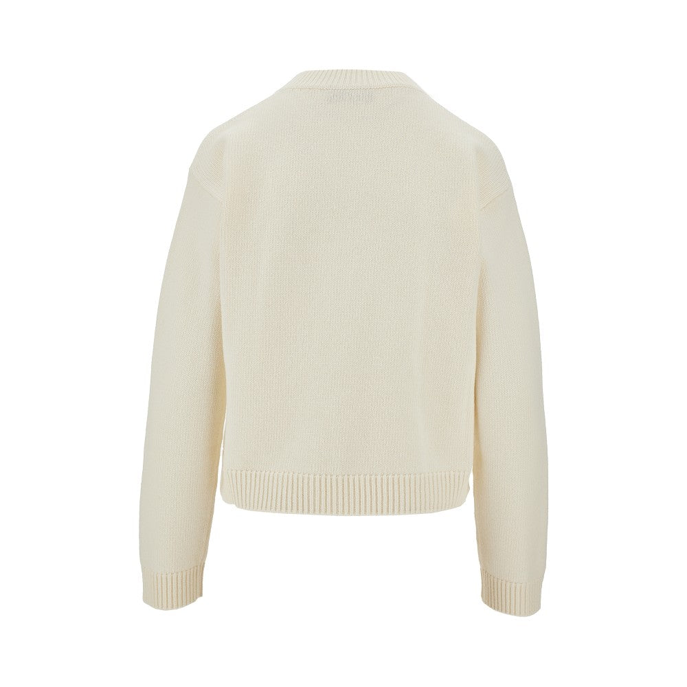 Wool sweater with logo inlay
