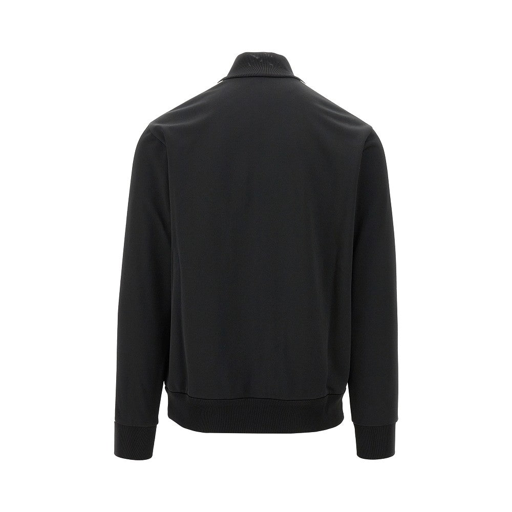 Track jacket with logo patch