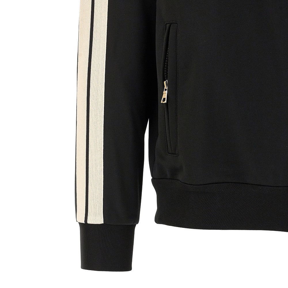 Track jacket with logo patch