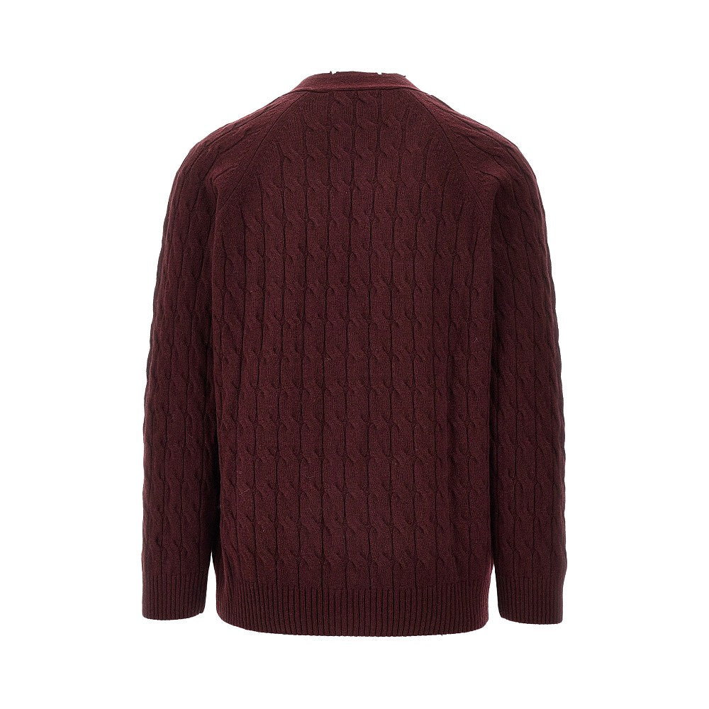 Cardigan a trecce con effetto distressed