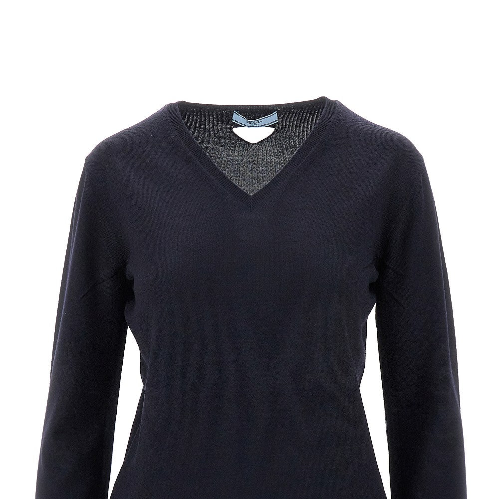 Wool sweater with cut-out logo