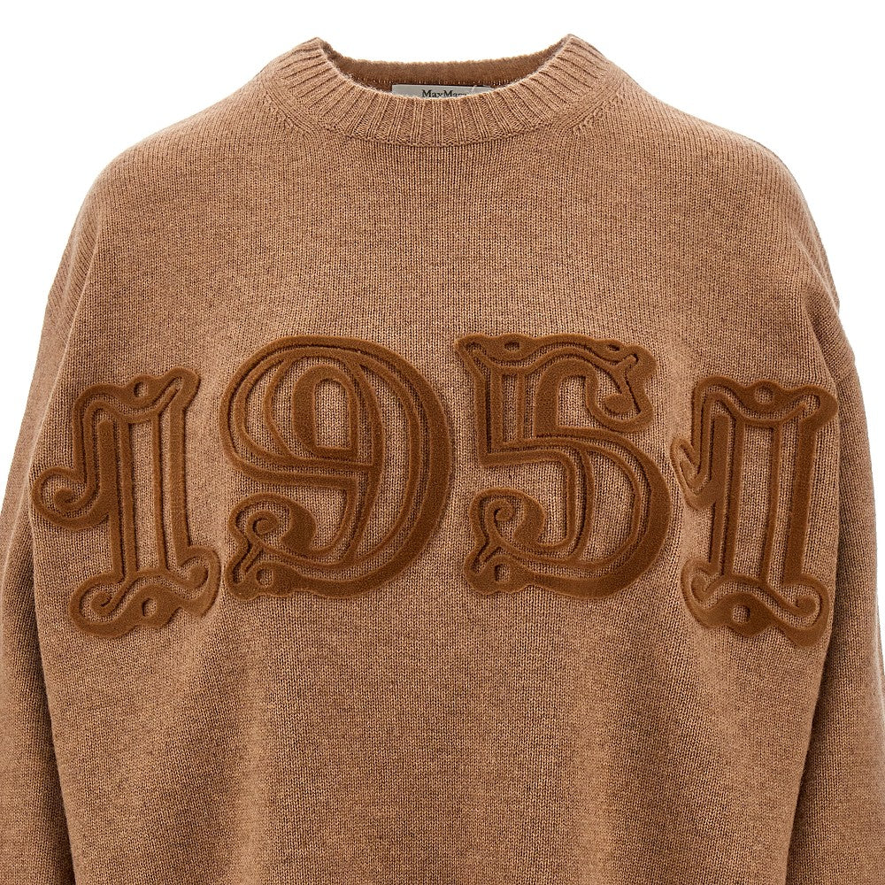 Sweater with sequinned embroidery
