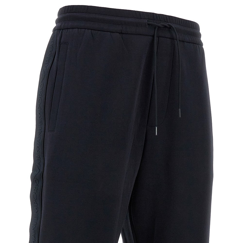 Joggers in double jersey con banda logata