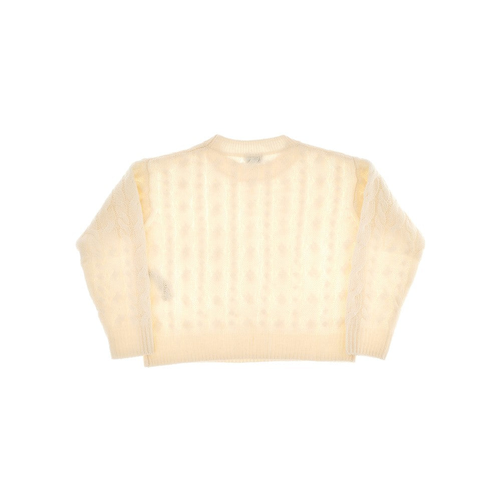 Pullover in lana a trecce