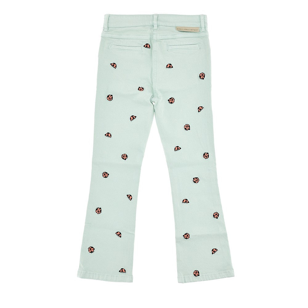 Flared jeans with embroidered ladybugs