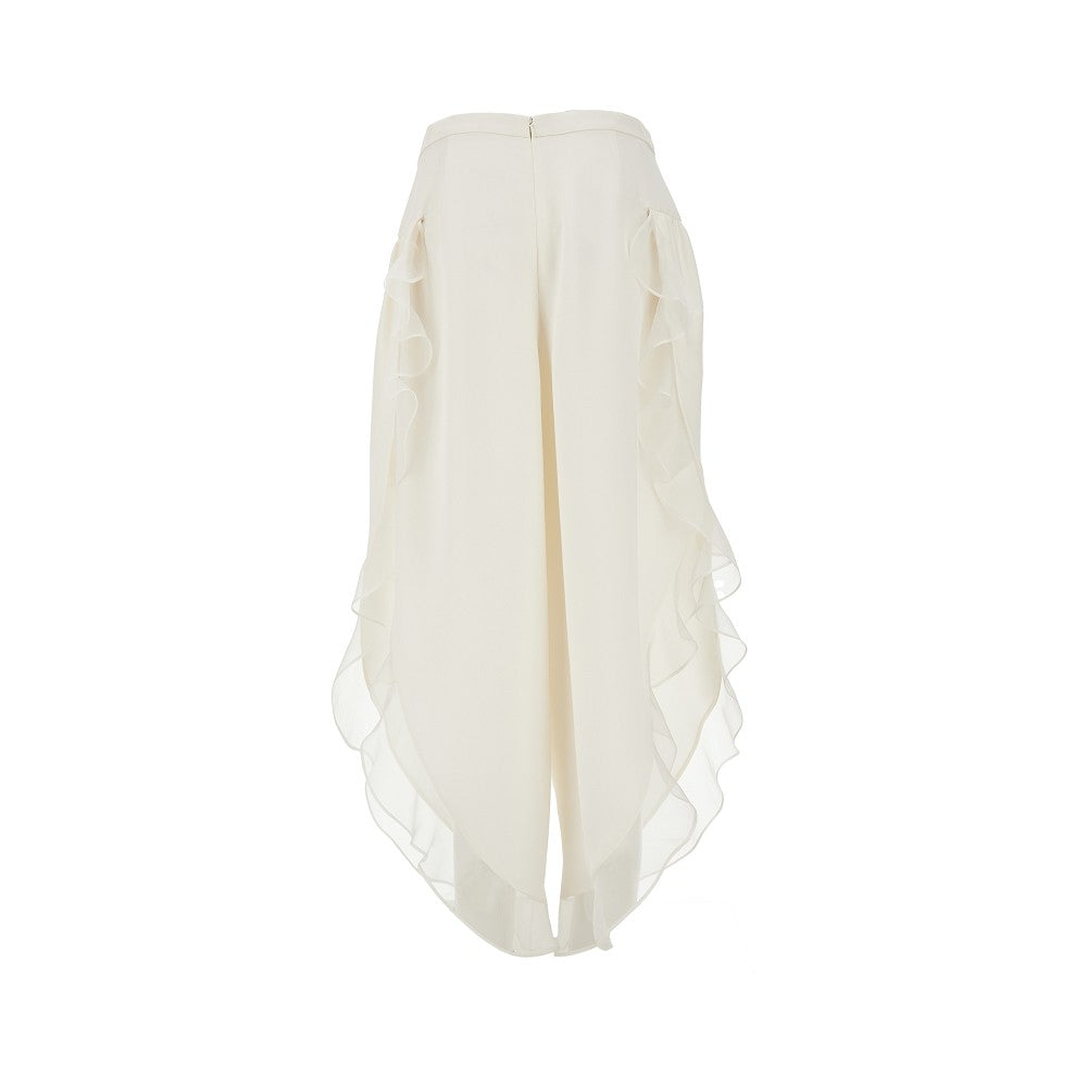 Pantaloni ampi in seta con volant