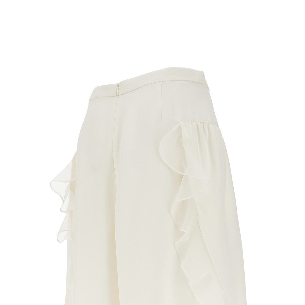 Pantaloni ampi in seta con volant