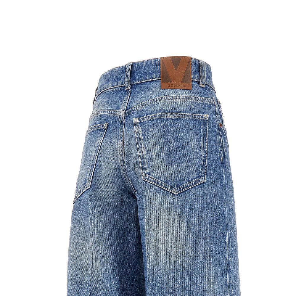 Jeans a gamba ampia con bordo jacquard