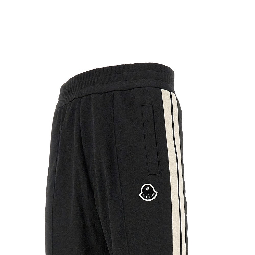 Track pants with logo patch