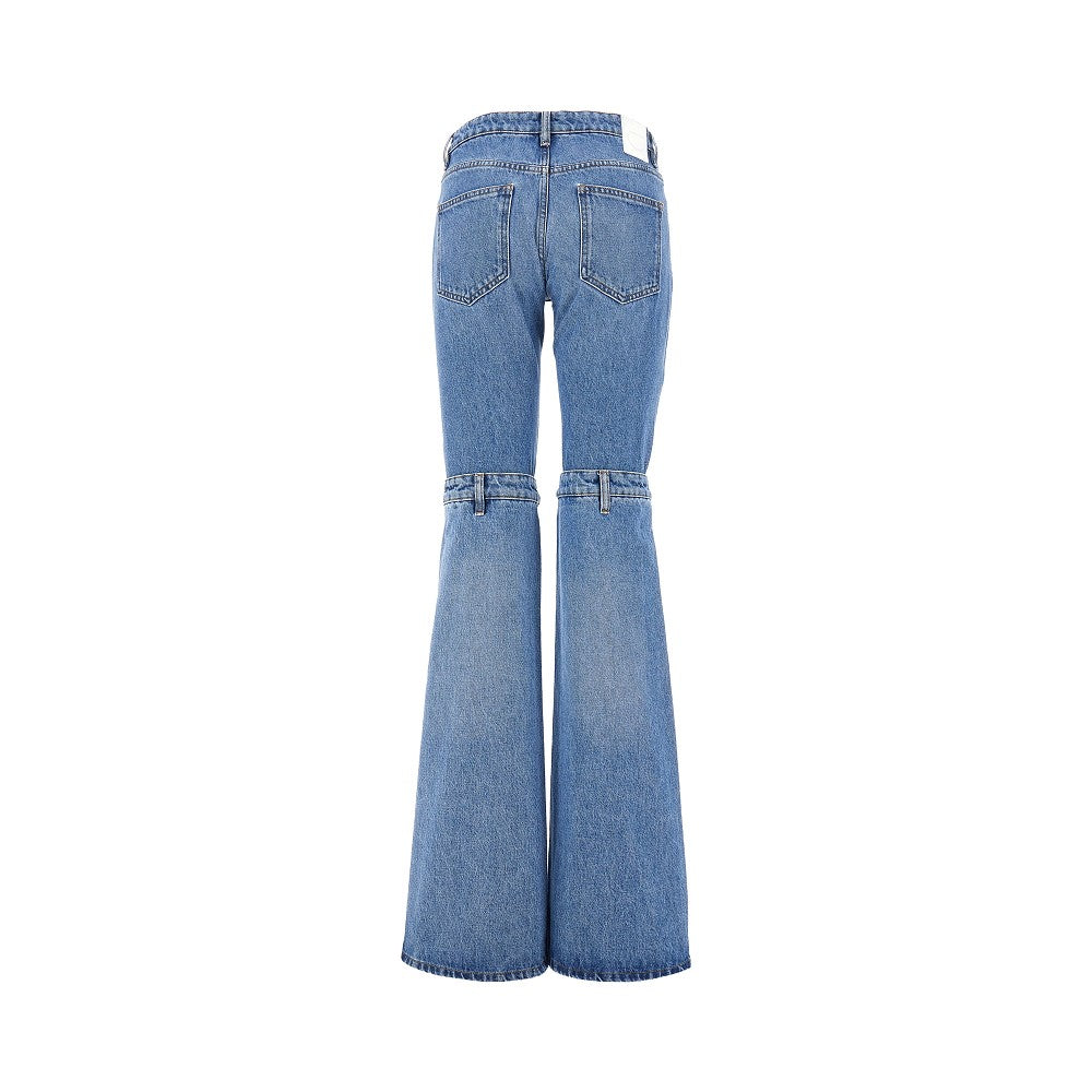 Jeans con aperture sulle ginocchia