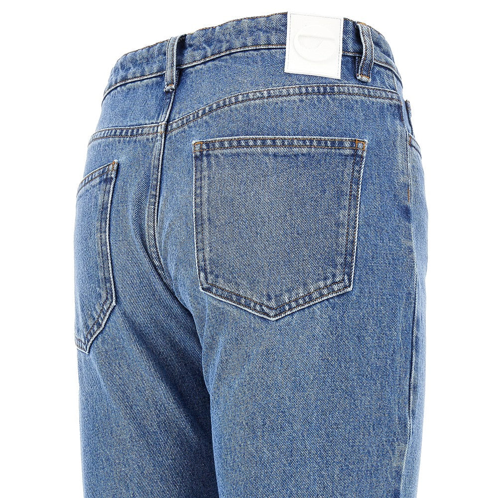 Jeans con aperture sulle ginocchia