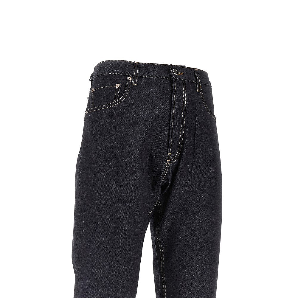Raw demim jeans with leather buckled strap