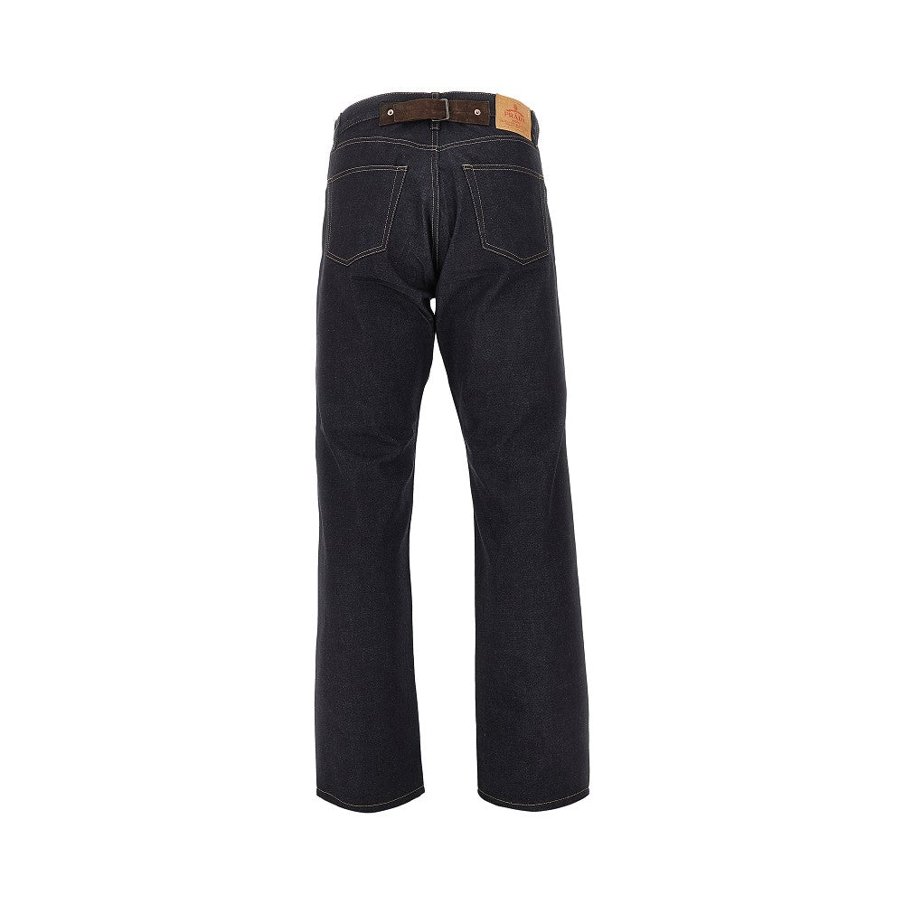 Raw demim jeans with leather buckled strap