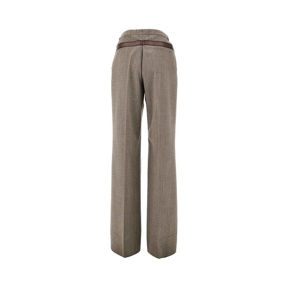 Pants with trompe l'oeil effect belt