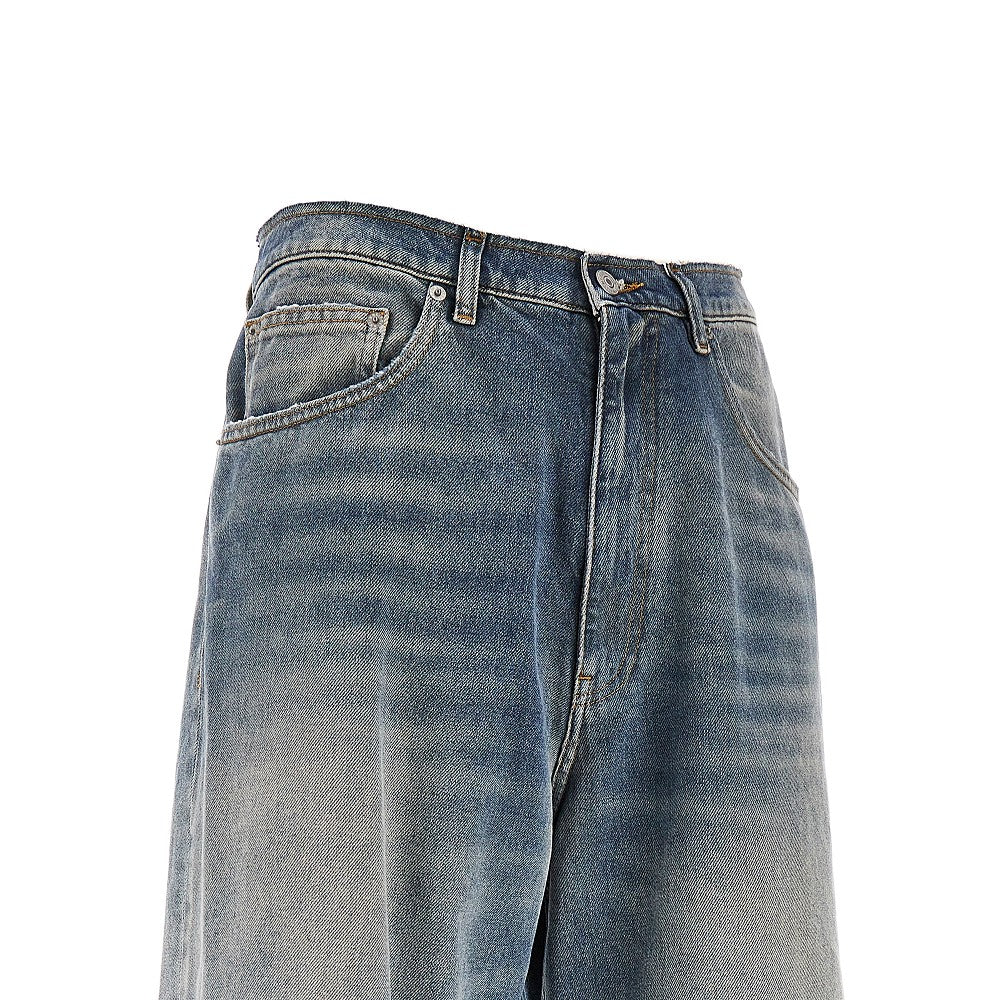 Jeans a gamba ampia con vita a taglio vivo