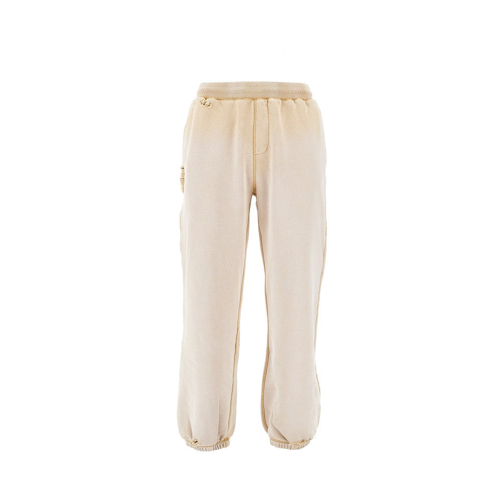 Joggers distressed con effetto scolorito