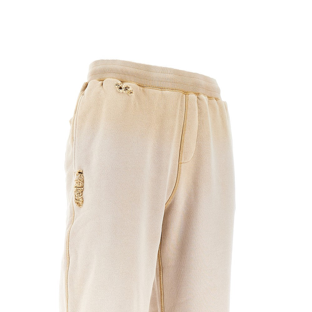 Joggers distressed con effetto scolorito