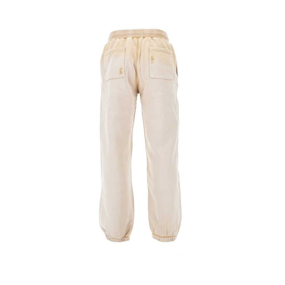 Joggers distressed con effetto scolorito