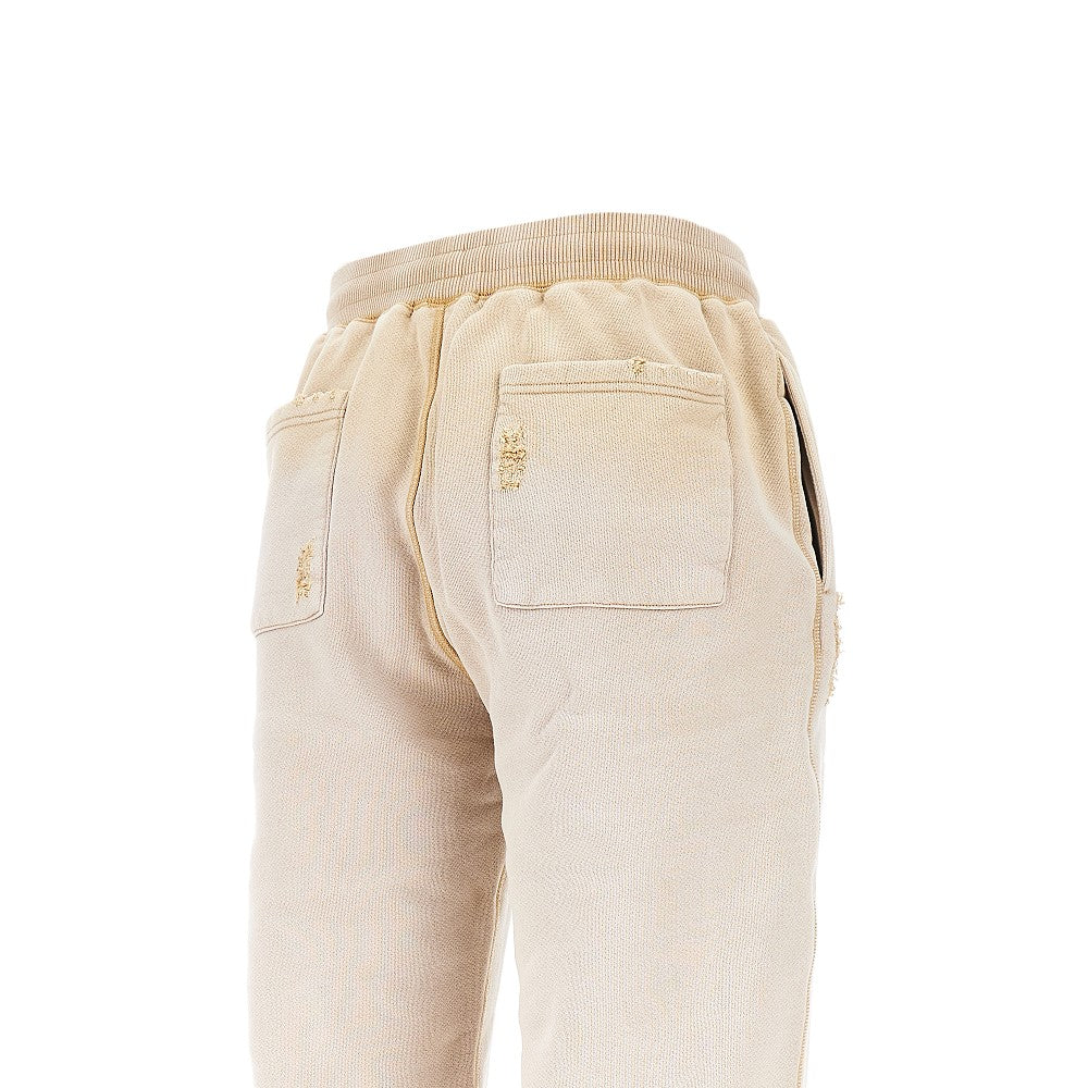 Joggers distressed con effetto scolorito