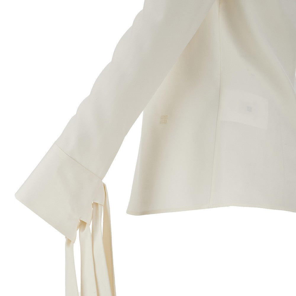 Blusa in seta con polsini annodati