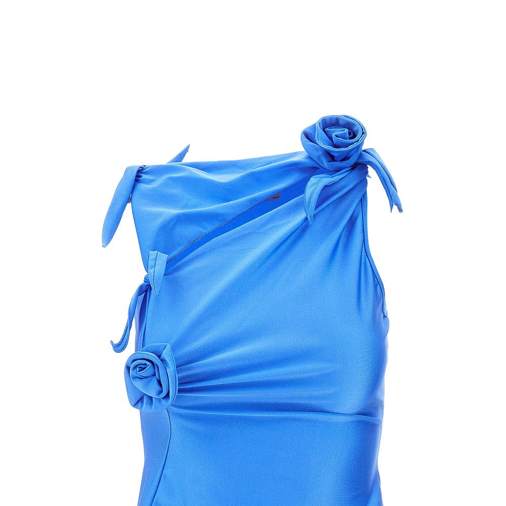 Top asimmetrico con dettagli floreali