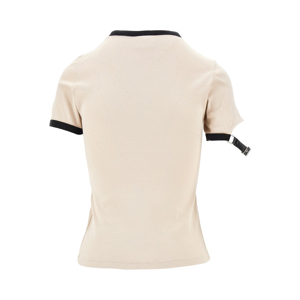 T-shirt con cinturino sulla manica