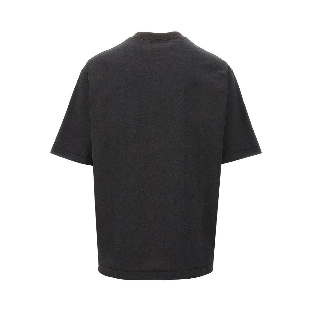 T-shirt con firma "Gucci"