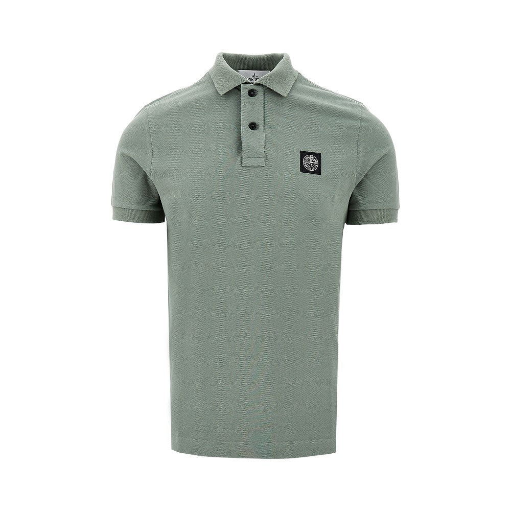Polo in piquet stretch con patch logo