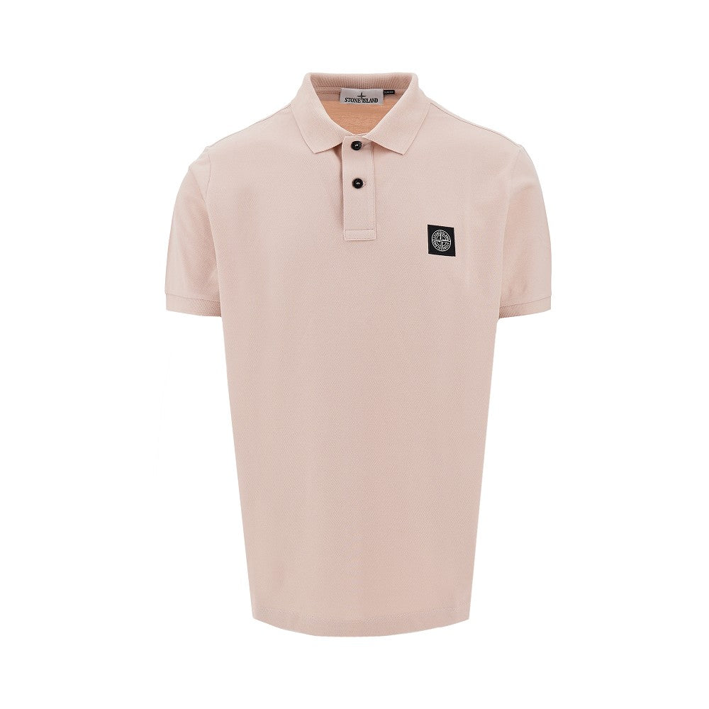 Polo in piquet stretch con patch logo