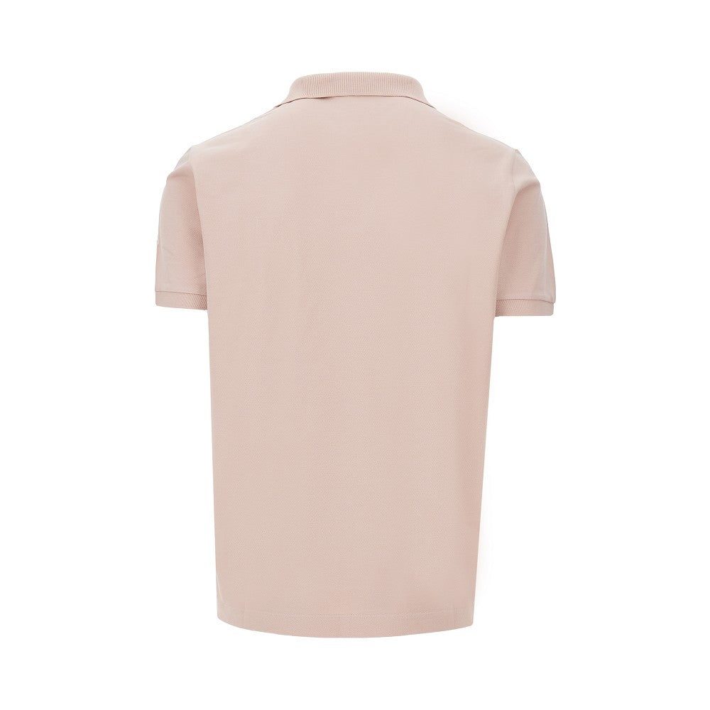 Polo in piquet stretch con patch logo