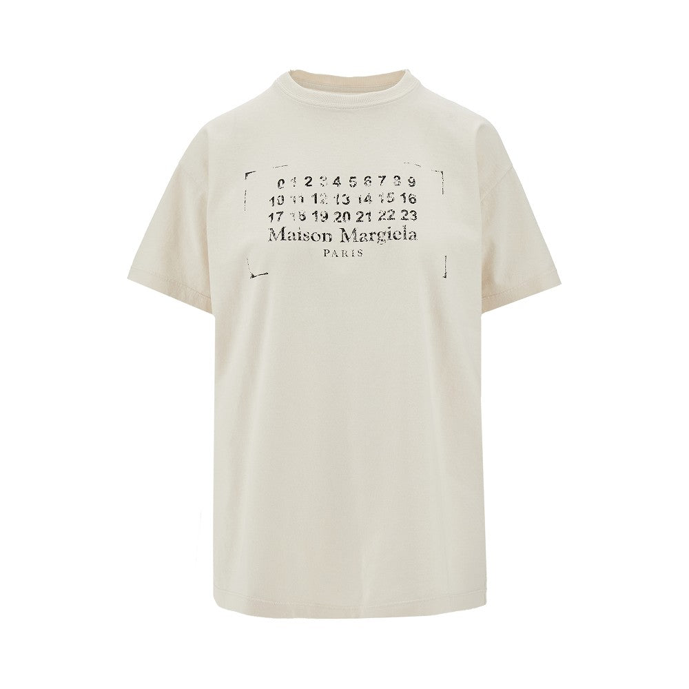 T-shirt con stampa logo scolorito