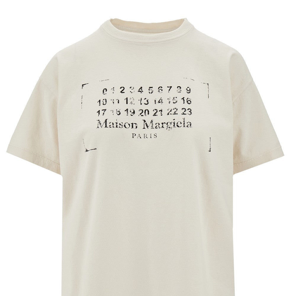 T-shirt con stampa logo scolorito