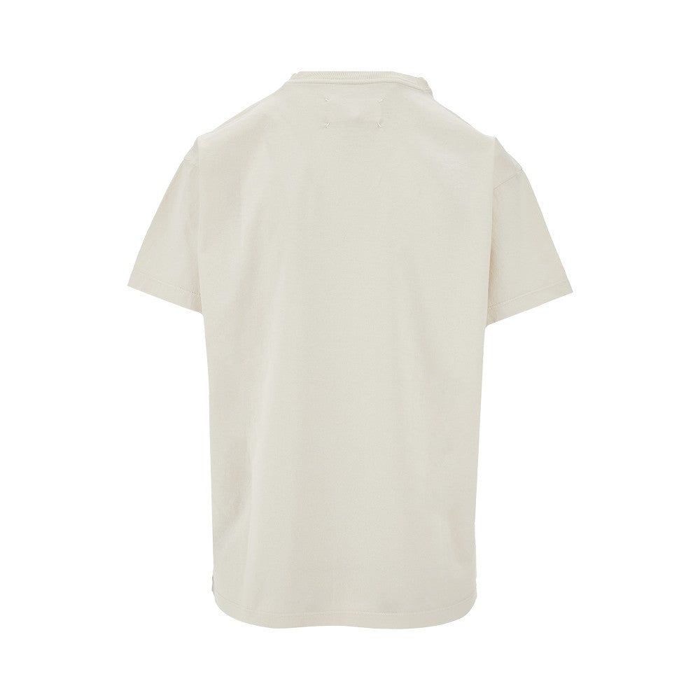 T-shirt con stampa logo scolorito