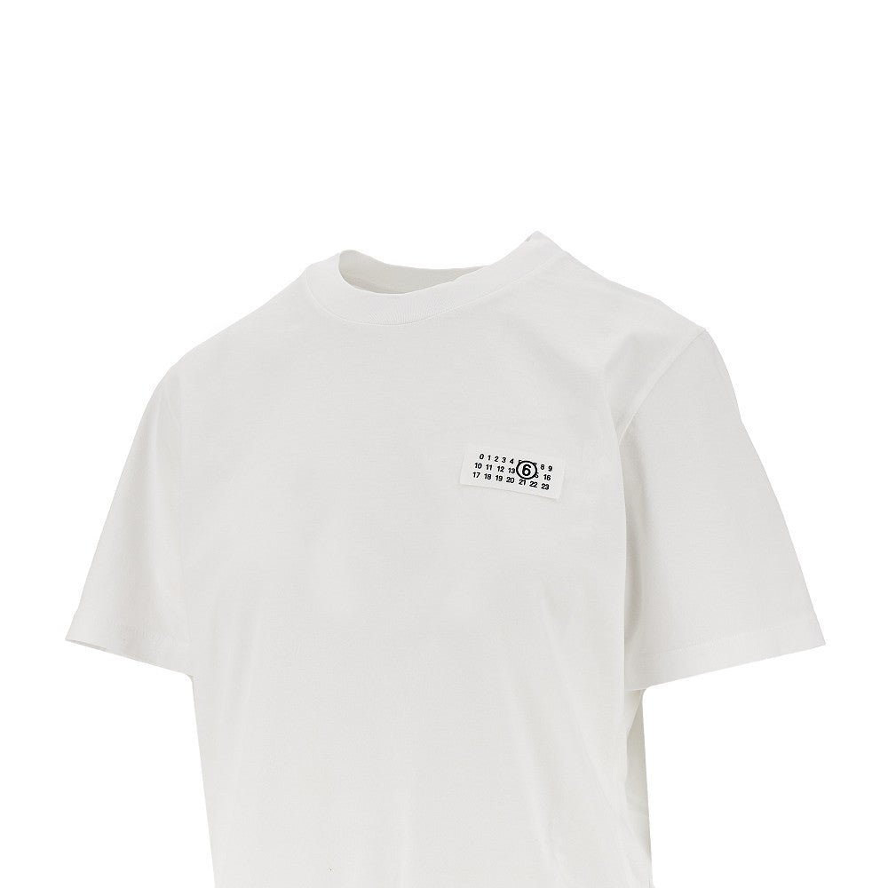 T-shirt con etichetta e stampa trompe l'oeil