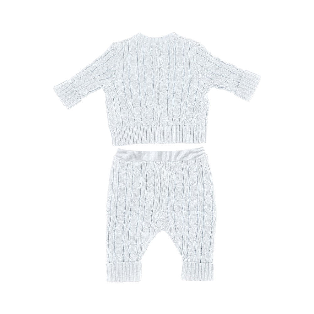 Completino in maglia a trecce