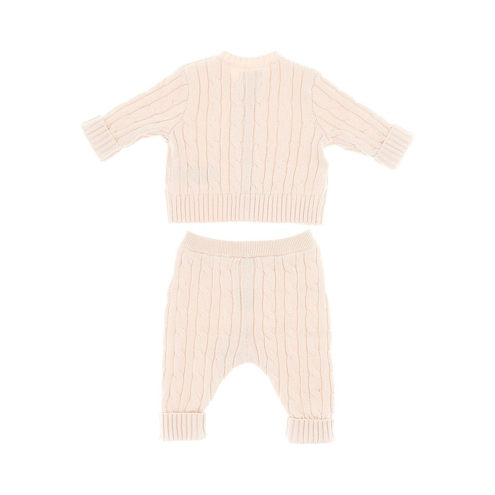 Completino in maglia a trecce
