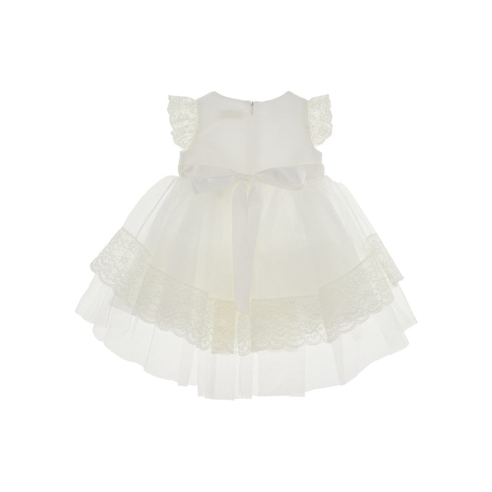 Abitino in tulle con pizzo e spilla floreale