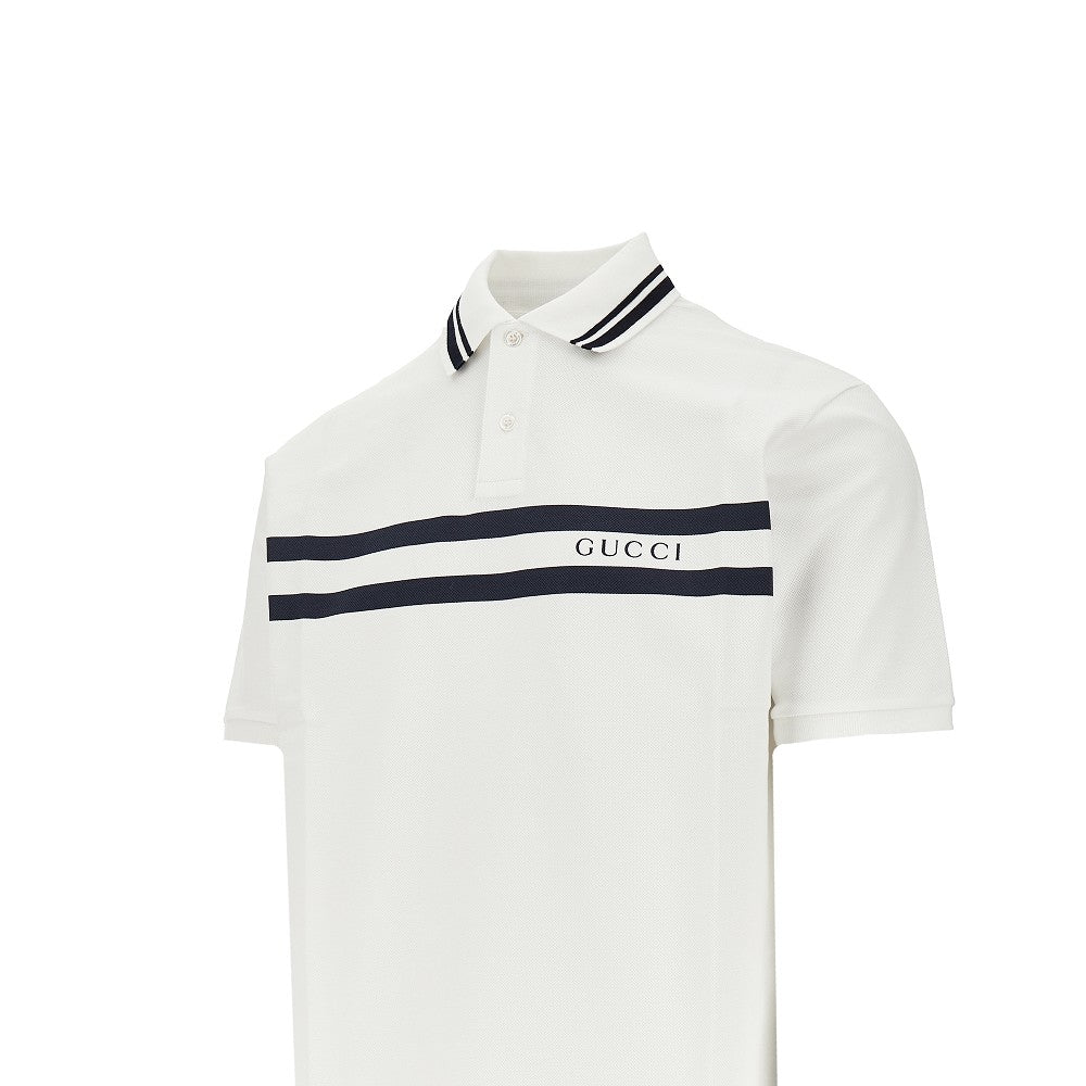 Polo in piquet stretch con stampa a righe