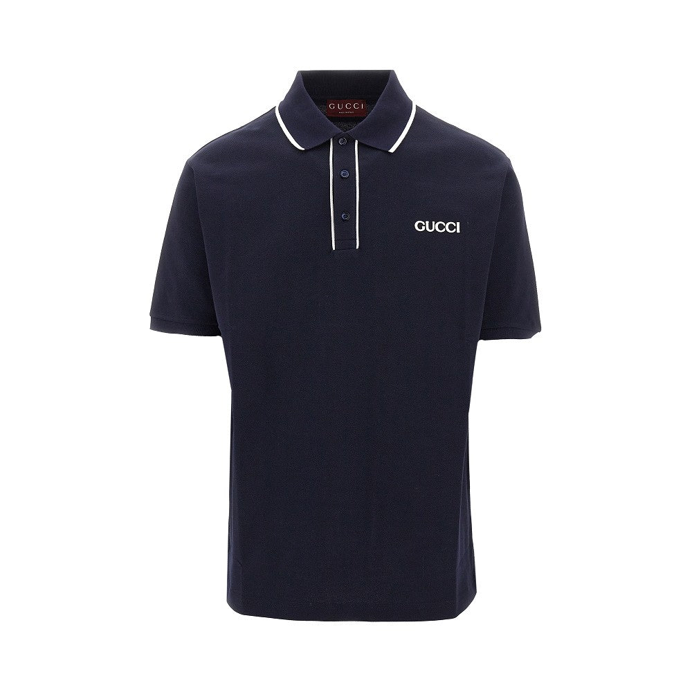 Polo in piquet stretch con patch logo