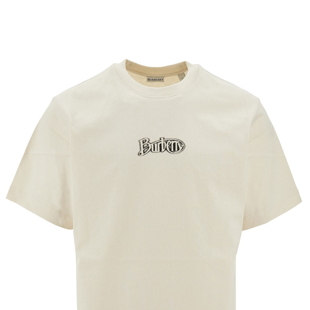 T-shirt con logo floccato