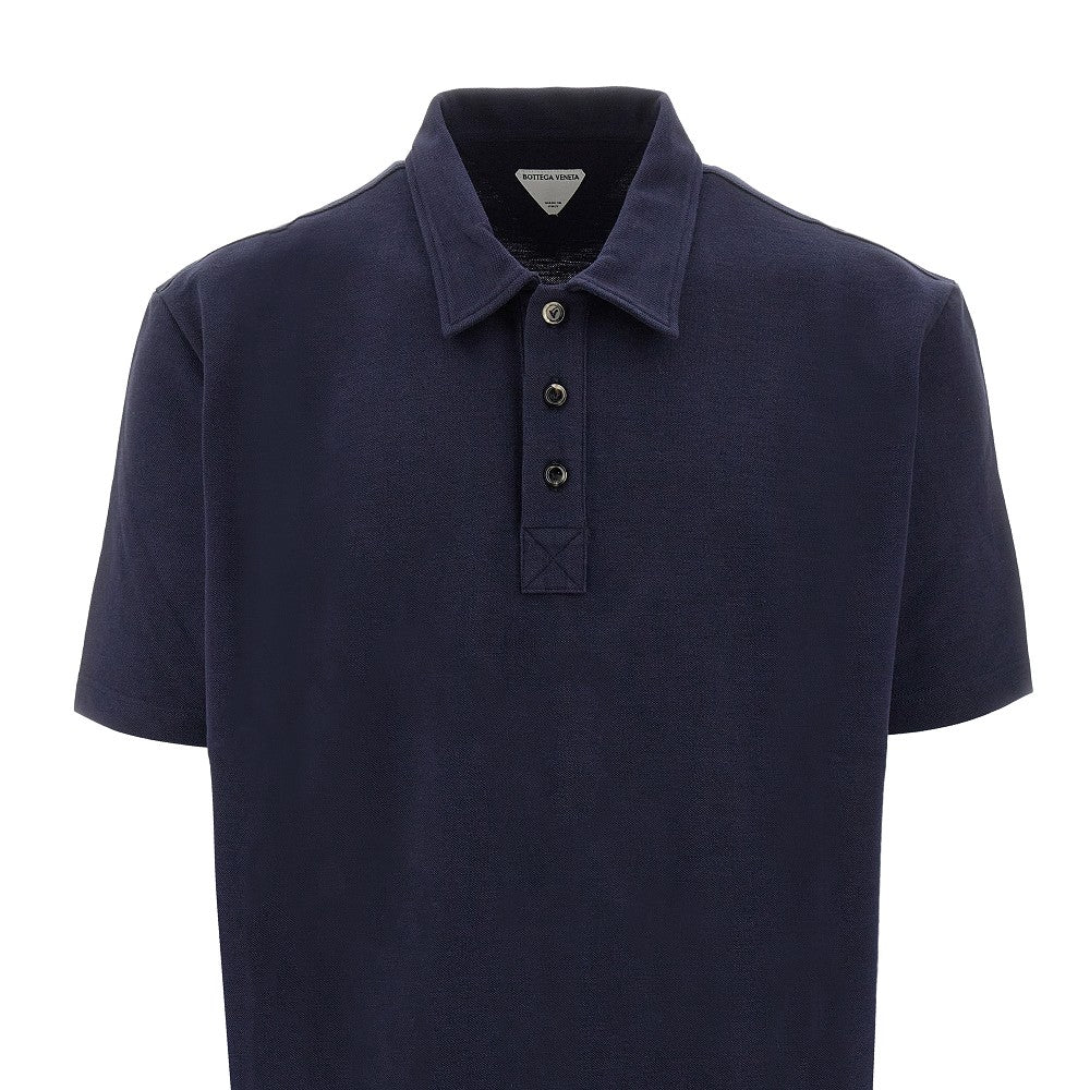 Polo in piquet con firma ricamata