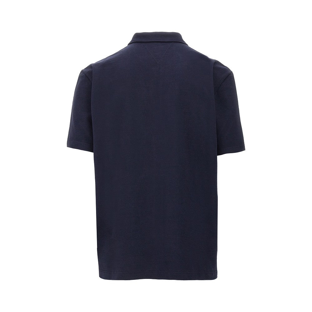 Polo in piquet con firma ricamata