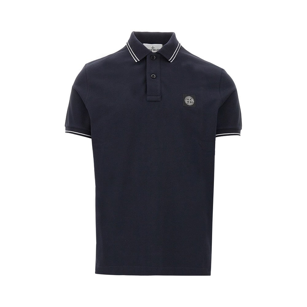 Polo in piquet stretch con patch logo